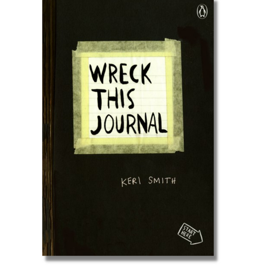 Cover image of "Wreck This Journal," by Keri Smith, showing a black cover with the book title centered in the middle surrounded by masking tape. There is a drawing of a penguin in the upper right-hand corner and a drawing of an arrow with the words, "Start Here" in the lower right-hand corner.